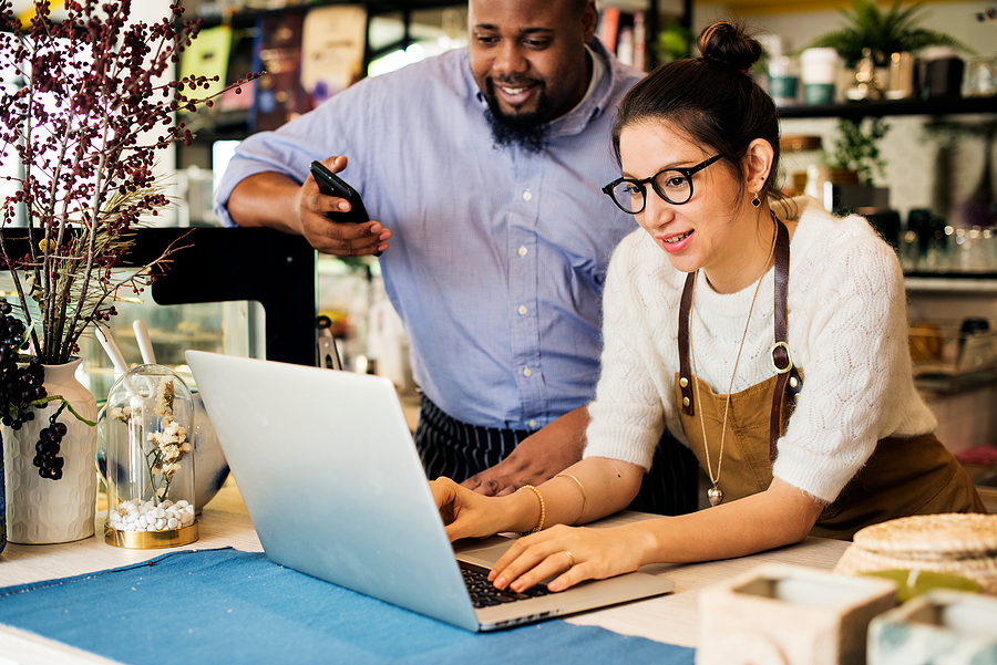 A business owner actively listening and adapting during a negotiation, embodying the essence of flexibility in decision-making.